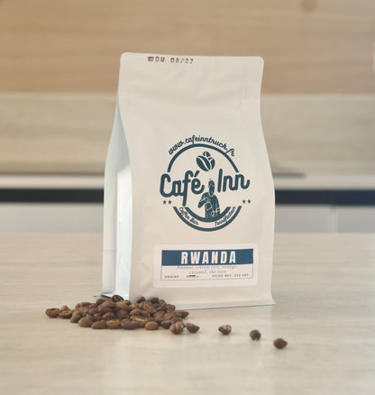 Grains de café Rwanda Cyiya 843 à côté du sachet Café Inn